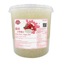 Pot transparent de topping litchi aux morceaux visibles pour desserts et boissons